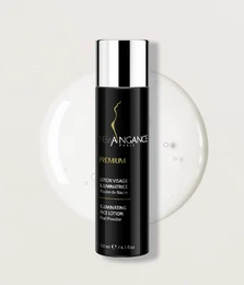 Illuminating face lotion in a sleek black bottle with silver accents. Contains moisturizing and brightening ingredients for a radiant complexion.