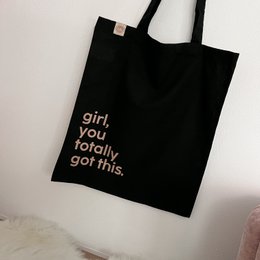  Black tote bag with text "girl you totally got this" in white lettering. Durable cotton material, suitable for everyday use as a shoulder bag or reusable shopping bag.