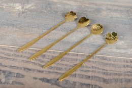 Lange bloem gouden lepels - veel van 4