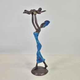 Scultura in bronzo "Baby in the air" di Soré | diverse dimensioni e colori