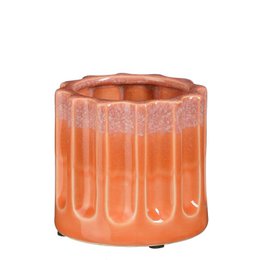  A round, orange ceramic plant pot with a textured, faceted design.
