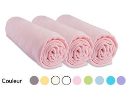 Set of 3 100% cotton jersey fitted sheets in a variety of pastel colors including ciel, turquoise, blanc, gris, anis, parme, ecru, jaune, and rose. Soft, comfortable, and perfect for a crib.