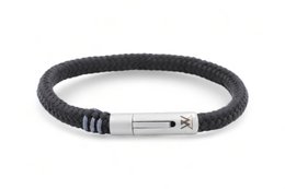 Rope bracelet 6mm - Ruyter collection | Edition silver. Woven bracelet available in various colors and sizes from XS to XL. Made of durable rope material with a silver-colored metal clasp.