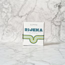 Lavender, rosemary, and amyris scented soap bar with a rectangular shape and a minimalist packaging design.