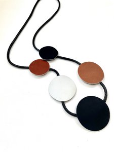Artistic necklace of leather in round shapes