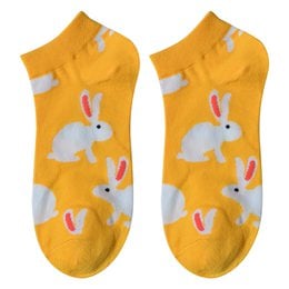 Yellow socks with white rabbits and red hearts. Made of polyester, size 36-41.