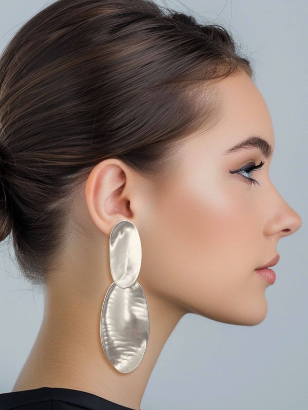 Meia silver colored statement earrings