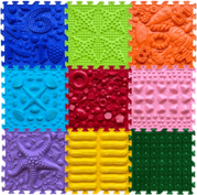 Colorful textured plastic tiles in various shapes and patterns, including hearts, circles, and other geometric designs. The tiles are described as premium quality, extra durable, and easy to assemble, with a long-lasting warranty.
