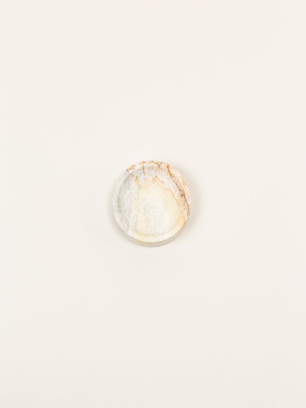 Small wide round box in stone with natural stone lid