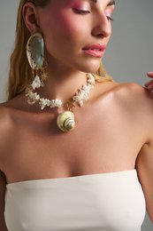 Thalassa oorbellen – asymmetrische schelp- en zeesteroorbellen