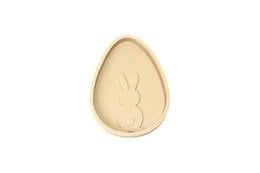 Decorative Easter egg-shaped plaque with an embossed Easter bunny design. Beige color, oval shape.
