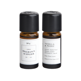Two small glass bottles with black caps, containing a vanilla and peony scented diffuser refill. The bottles are placed on a white surface, with a hand reaching towards them.

The image shows two small glass bottles with black caps, containing a vanilla and peony scented diffuser refill. The bottles are placed on a white surface, with a hand reaching towards them. Based on the product title and category, this appears to be a set of diffuser refills in a vanilla and peony fragrance.
