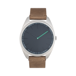 Silver watch with a round face, brown leather strap, and minimalist design featuring a simple dial with a single hand.