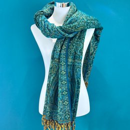 Floral patterned scarf made from a mix of yak wool, featuring shades of green and gold.