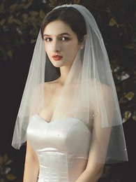 Elegante tweedelige bruidssluier met kleine parels
