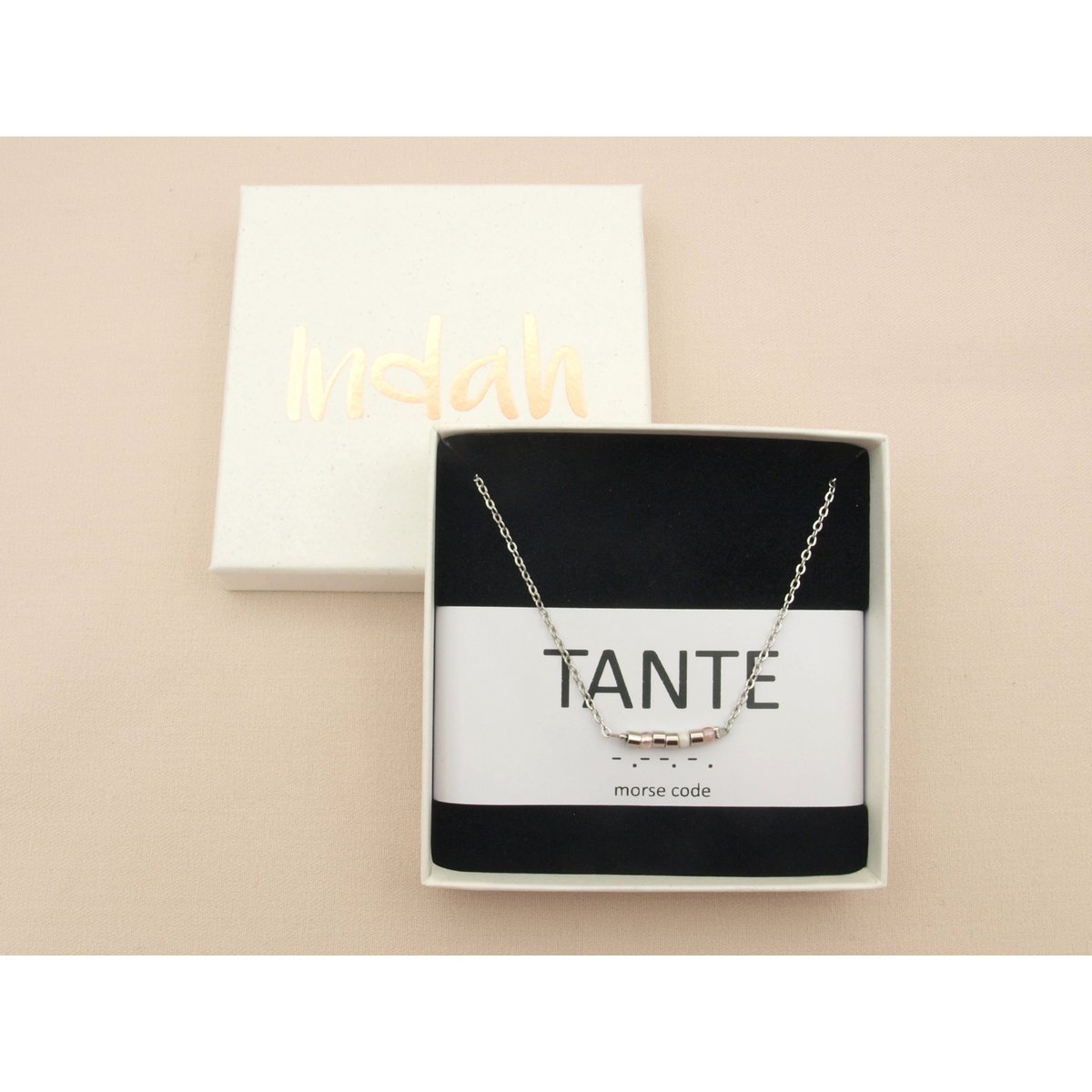 Morse code ketting, tante