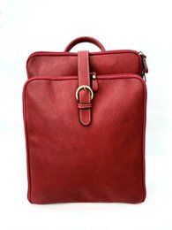  Red leather backpack, rectangular shape, top handle, adjustable straps, vintage style, spacious compartment