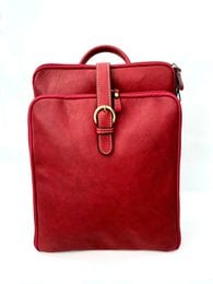 Red leather backpack, rectangular shape, top handle, adjustable straps, vintage style, spacious compartment