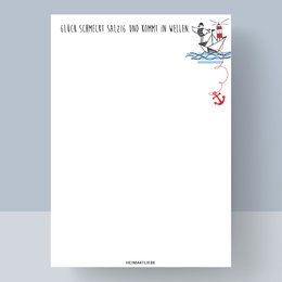 A white notepad with a playful, hand-drawn design featuring a sailboat, seagulls, and the text "Happiness tastes salty" in a whimsical font.