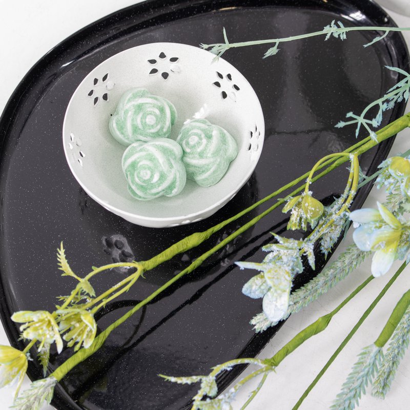 Bowl of white flowers