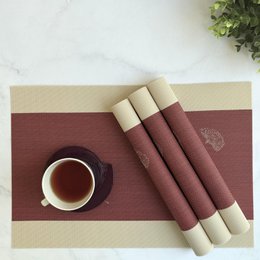  Woven PVC placemats, burgundy and beige striped, anti-skid, set of four, textured weave pattern.