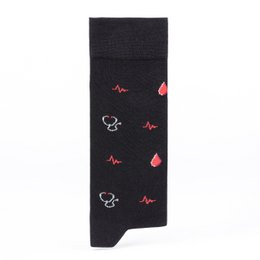 Black socks with red heart and skull patterns, suitable for casual or formal wear.