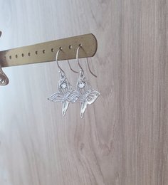 Rhodium plated butterfly earrings with charms