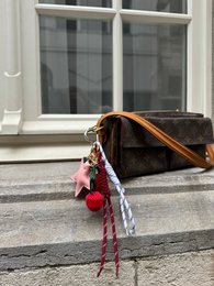 Pink stellar bag charm