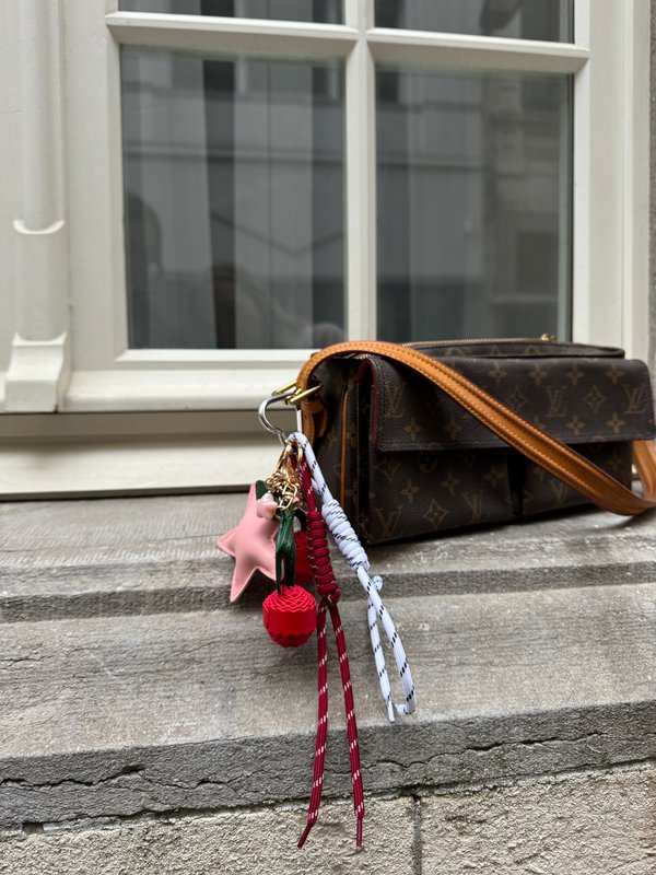 Pink stellar bag charm
