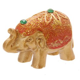 Elefante de la suerte con purpurina metálica en una mini bolsa de regalo
