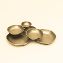 Gold textured aluminum serving bowls, small and large sizes, modern metallic finish dinnerware.