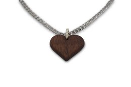 Handmade necklace with round mahogany wood pendant on silver curb chain.
