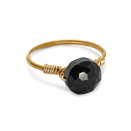 A statement ring featuring a large, faceted onyx stone set in a gold-tone band. The ring has a bold, modern design and is available in sizes 16-18 and one size S (15-18) and one size L (18-22).