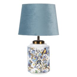 A table lamp with a blue and white ceramic base featuring a floral pattern, and a blue velvet lamp shade. The lamp measures approximately 25cm in diameter and 41cm in height, and uses an E27 bulb with a maximum of 60W.
