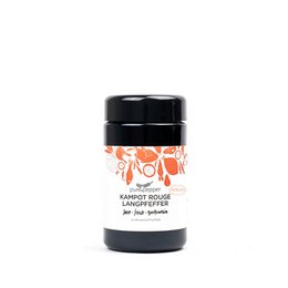 Kampot Rouge long pepper beads, a single spice product available in glass or refill pack. The product features a round, dark-colored container with an orange and white label design.