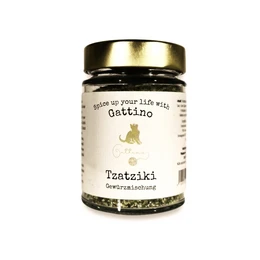  Harissa spice mixture, a blend of chili peppers, garlic, cumin, and other spices, with a vibrant orange-red color and a complex, aromatic flavor profile.