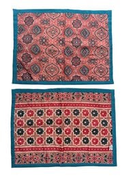 Quilted sari placemats, red and blue patterned, traditional geometric floral design, reversible textile.