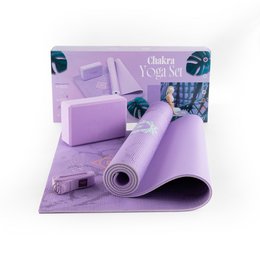 Purple yoga mat set with blocks, straps, and chakra design for beginners.
