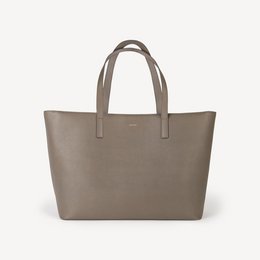 Taupe vegan leather tote bag with a simple, minimalist design. Features a spacious interior and durable handles for everyday use.