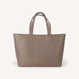 Taupe vegan leather tote bag with a simple, minimalist design. Features a spacious interior and durable handles for everyday use.