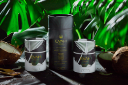 Superfood beauty products in a dark green and black packaging, featuring a bottle and two jars with a tropical leaf background.