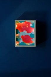Colorful abstract night light with a whimsical, playful design featuring red, blue, and green shapes. Suitable for a child's bedroom or nursery.