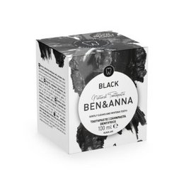 Black and white toothpaste in glass jars, without fluoride, for whitening and sensitive teeth.