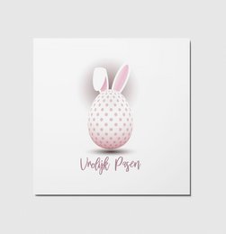 Polka dot Easter egg with rabbit ears, pastel pink and white colors, festive Easter postcard design.