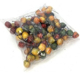 Colorful decorative beads: red, yellow, green, black round balls craft supplies.