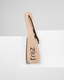Wooden shoehorn with the word "fitz" engraved on it. Designed for easy shoe-wearing.