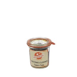 A jar of Shii-take mushroom pasta sauce with soy sauce. The sauce has a dark brown color and appears to be a savory, umami-rich condiment.