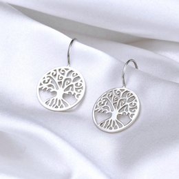 Sterling silver drop earrings featuring a tree of life design. Elegant and minimalist style.