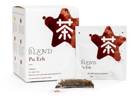 Pu Erh tea with coconut flavor, packaged in a 15-pyramid box. The tea leaves have a dark color and contain coconut pieces, creating a unique and aromatic blend.