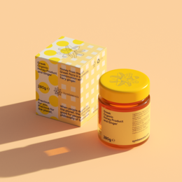 Greek organic honey with ginger, golden yellow honey in a glass jar, natural and healthy sweetener